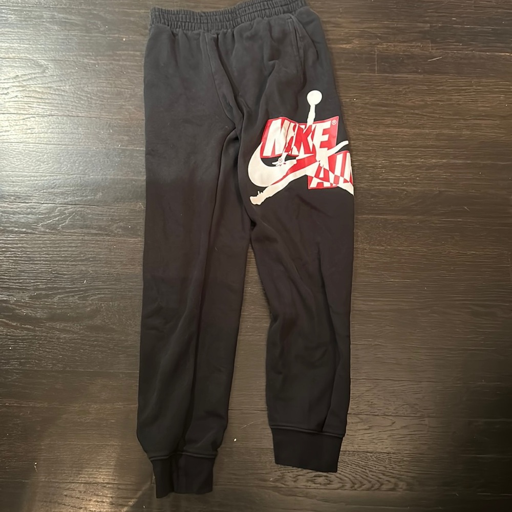 Nike Jordan black and red drawstring jogger pants boys size large